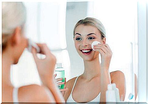 woman applying tonic lotion to have healthy and soft skin