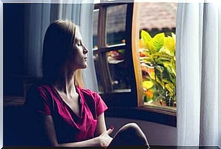 A woman at her window.